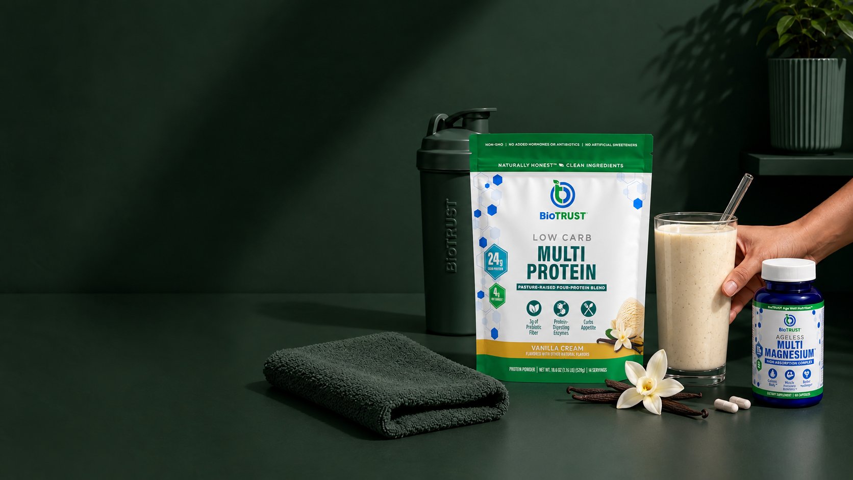 BioTRUST Low Carb Multi Protein and Ageless Multi Magnesium on a dark green counter