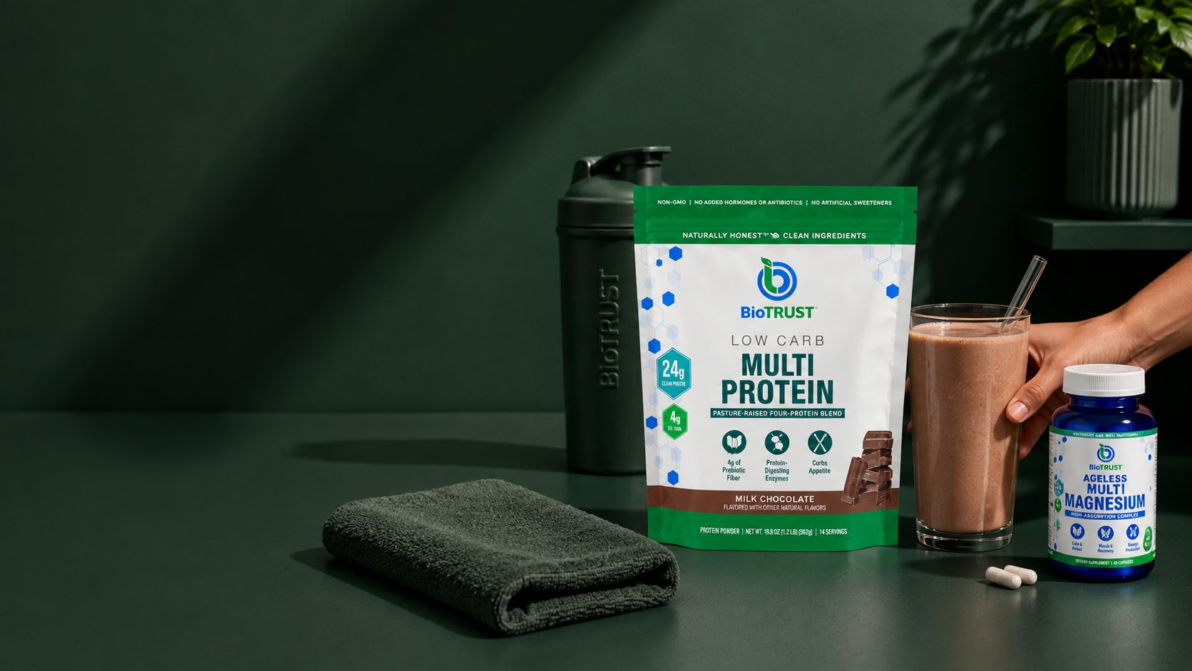 BioTRUST Low Carb Multi Protein and Ageless Multi Magnesium on a dark green counter