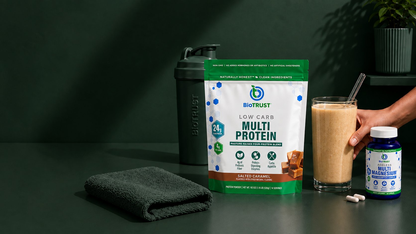 BioTRUST Low Carb Multi Protein and Ageless Multi Magnesium on a dark green counter